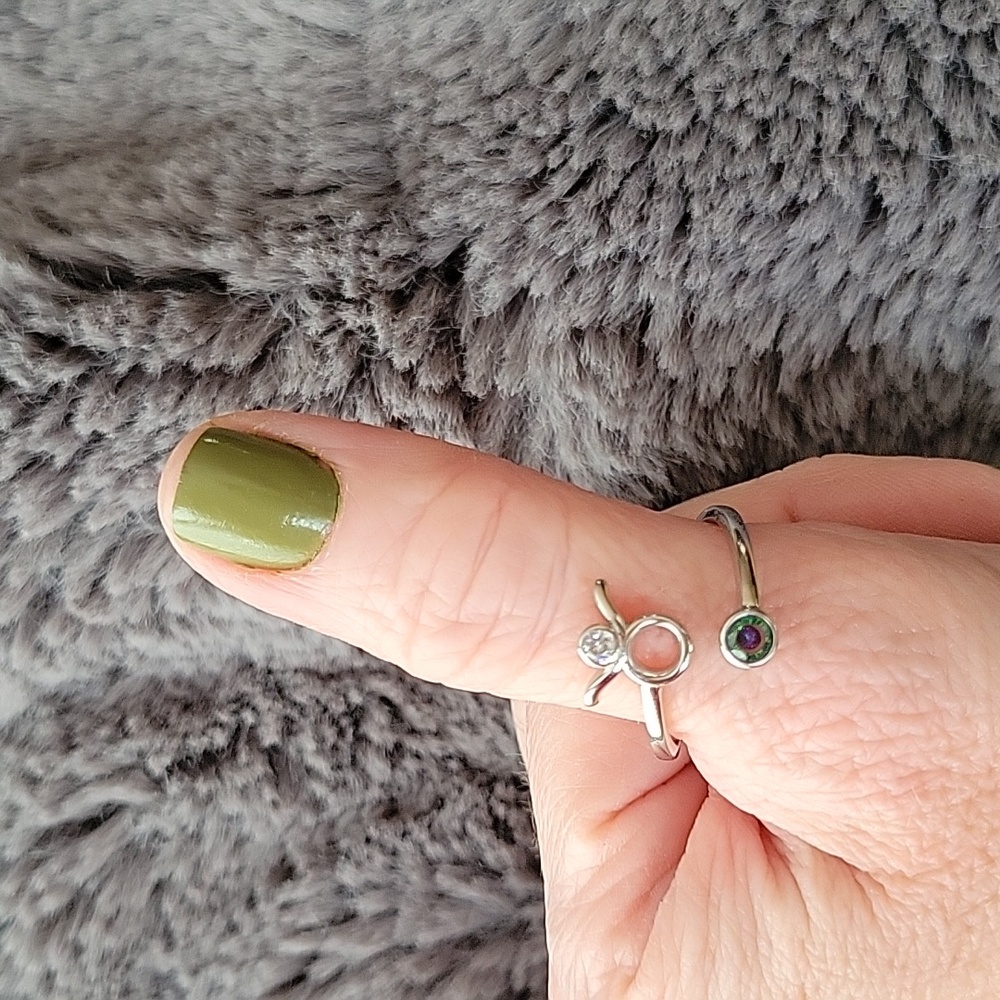 Adjustable Taurus ring with 2 stones
